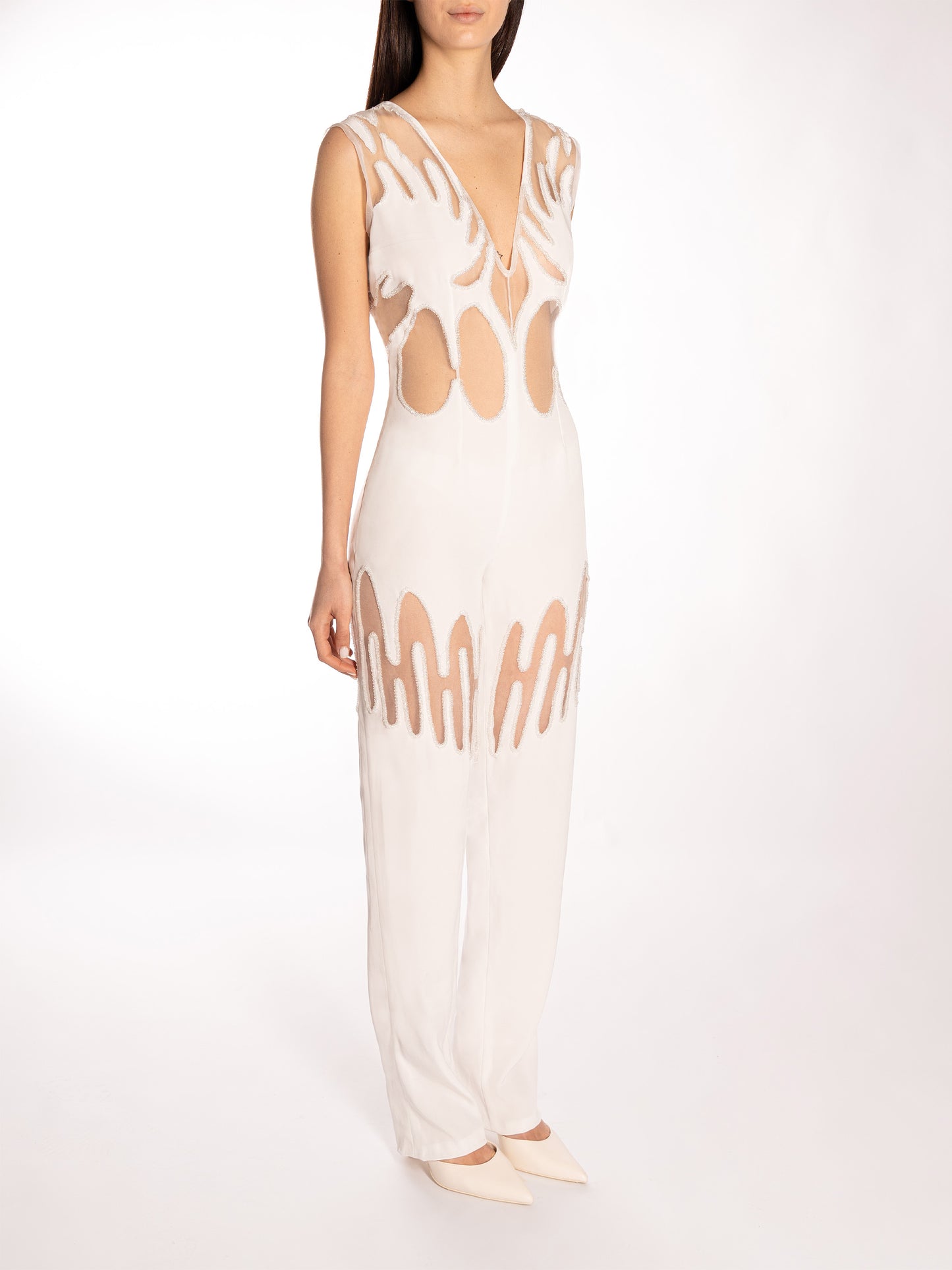 Tuta con ricami e cut out